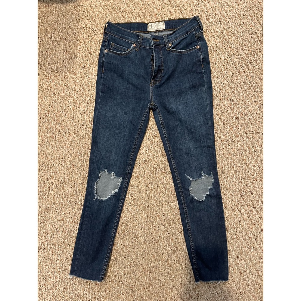 Free People Skinny Jeans w/busted knees and raw hem 27